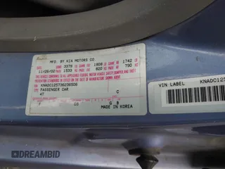 2003 Kia Rio with VIN KNADC125736236506, listed as a IAAI auction lot 41467649 with 109,975 mi miles. Bid and sale history available at carsss.com. Image 9.