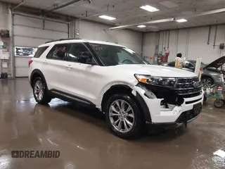 2020 Ford Explorer XLT z VIN 1FMSK8DH2LGA21411, wystawiony jako IAAI lot #41605079 z przebiegiem 74 795 mil mil oraz . Historia ofert i sprzedaży dostępna na DreamBid. Obrazek 1.