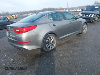 2014 Kia Optima SX Turbo with VIN 5XXGR4A64EG286133, listed as a IAAI auction lot 41489575 with 68,573 mi miles and . Bid and sale history available at DreamBid. Image 4.