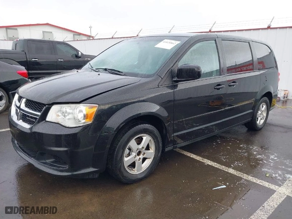 2011 Dodge Grand Caravan Mainstreet with VIN 2D4RN3DG1BR731727, listed as a IAAI auction lot 41820862 with 165,667 mi miles. Bid and sale history available at carsss.com. Image 2.
