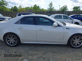 2013 Cadillac CTS Premium z VIN 1G6DS5E3XD0106332, wystawiony jako IAAI lot #42152577 z przebiegiem 114 700 mil mil oraz . Historia ofert i sprzedaży dostępna na DreamBid. Obrazek 13.