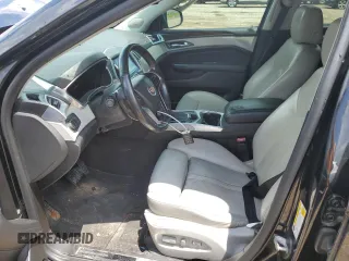2013 Cadillac SRX Luxury Collection z VIN 3GYFNCE36DS650301, wystawiony jako Copart lot #59977525 z przebiegiem 128 750 mil mil oraz Czysty tytuł • Clean title. Historia ofert i sprzedaży dostępna na DreamBid. Obrazek 7.