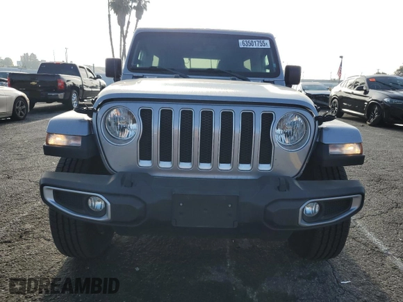 2019 Jeep Wrangler Unlimited Sahara with VIN 1C4HJXEN0KW616942, listed as a Copart auction lot 63501755 with 57,095 mi miles and Salvage title. Bid and sale history available at DreamBid. Image 5.