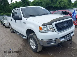 2004 Ford F-150 XLT with VIN 1FTRW14W54KA12391, listed as a IAAI auction lot 42766650 with 210,546 mi miles and . Bid and sale history available at DreamBid. Image 1.