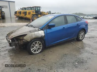2018 Ford Focus SE z VIN 1FADP3FE6JL227653, wystawiony jako Copart lot #56827585 z przebiegiem Nie podano mil oraz Szkoda całkowita • Salvage title. Historia ofert i sprzedaży dostępna na DreamBid. Obrazek 1.
