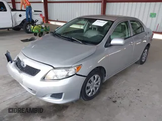 2010 Toyota Corolla with VIN JTDBU4EE2A9107184, listed as a IAAI auction lot 41861299 with 192,519 mi miles. Bid and sale history available at carsss.com. Image 2.