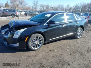2013 Cadillac XTS with VIN 2G61N5S38D9117544, listed as a IAAI auction lot 41681172 with 189,664 mi miles. Bid and sale history available at carsss.com. Image 2.