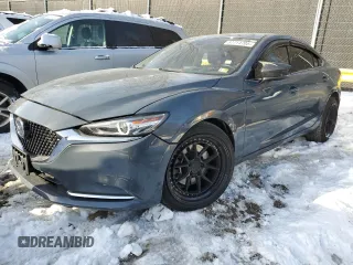 2021 Mazda 6 Carbon Edition with VIN JM1GL1WY0M1616208, listed as a Copart auction lot 87714705 with 48,240 mi miles and Salvage Title. Bid and sale history available at DreamBid. Image 1.