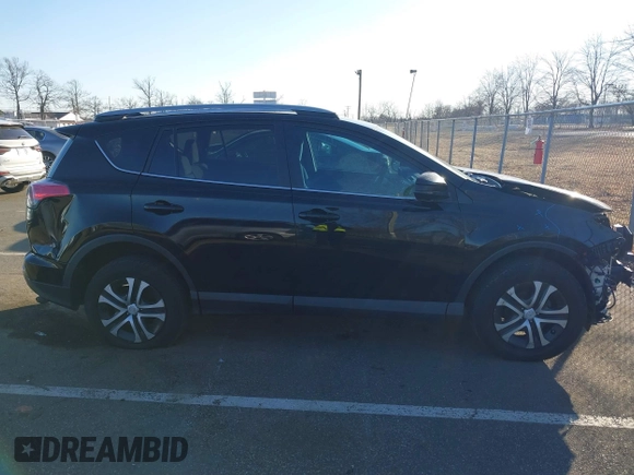 2017 Toyota RAV4 LE z VIN 2T3BFREV6HW543909, wystawiony jako IAAI lot #41668964 z przebiegiem 102 452 mil mil oraz . Historia ofert i sprzedaży dostępna na DreamBid. Obrazek 13.