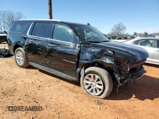 2023 Chevrolet Suburban Premier with VIN 1GNSCFKD1PR135410, listed as a Copart auction lot 50236775 with 40,364 mi miles and Salvage title. Bid and sale history available at DreamBid. Image 4.
