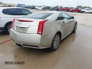 2013 Cadillac CTS Coupe Premium with VIN 1G6DS1E36D0107566, listed as a IAAI auction lot 42079197 with 122,386 mi miles. Bid and sale history available at carsss.com. Image 4.