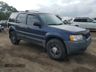 2004 Ford Escape XLS with VIN 1FMYU92104KA21454, listed as a Copart auction lot 74139564 with 217,731 mi miles and Salvage Title. Bid and sale history available at carsss.com. Image 4.