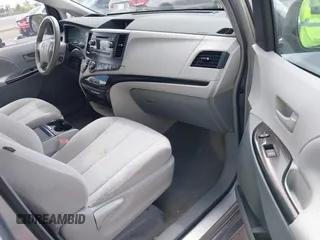 2013 Toyota Sienna LE AAS with VIN 5TDKK3DC4DS399295, listed as a IAAI auction lot 42173970 with 128,350 mi miles and . Bid and sale history available at DreamBid. Image 5.