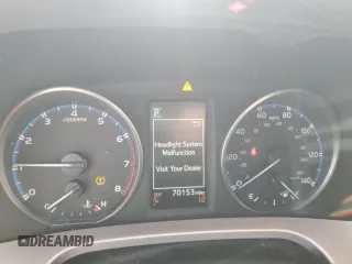 2018 Toyota RAV4 LE with VIN JTMBFREV0JJ235414, listed as a Copart auction lot 49786995 with 70,153 mi miles and Salvage Title. Bid and sale history available at DreamBid. Image 9.