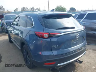 2021 Mazda CX-9 Carbon Edition z VIN JM3TCBDY0M0526352, wystawiony jako IAAI lot #42403901 z przebiegiem 50 193 mil mil oraz . Historia ofert i sprzedaży dostępna na DreamBid. Obrazek 3.