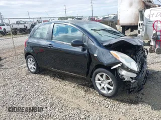 2007 Toyota Yaris with VIN JTDJT923975105026, listed as a IAAI auction lot 40091976 with 127,406 mi miles. Bid and sale history available at carsss.com. Image 1.