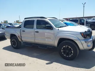 2010 Toyota Tacoma PreRunner z VIN 3TMJU4GN3AM098103, wystawiony jako IAAI lot #41981209 z przebiegiem 218 329 mil mil oraz . Historia ofert i sprzedaży dostępna na DreamBid. Obrazek 13.
