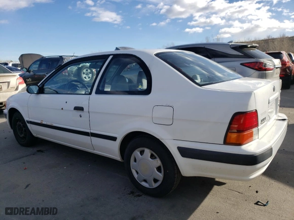 1995 Toyota Tercel DX with VIN JT2EL56D2S0027328, listed as a Copart auction lot 87222704 with 106,601 mi miles and Clean Title. Bid and sale history available at carsss.com. Image 2.