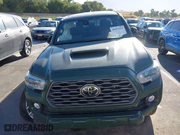 2021 Toyota Tacoma SR with VIN 3TYCZ5AN2MT039450, listed as a IAAI auction lot 40457613 with 54,176 mi miles and . Bid and sale history available at DreamBid. Image 12.