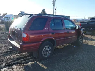 2002 Isuzu Rodeo with VIN 4S2DM58W624335632, listed as a IAAI auction lot 41690735 with 186,480 mi miles and . Bid and sale history available at DreamBid. Image 4.