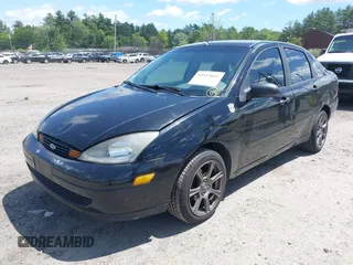 2004 Ford Focus SE z VIN 1FAFP34Z54W175689, wystawiony jako IAAI lot #42553615 z przebiegiem 188 652 mil mil oraz . Historia ofert i sprzedaży dostępna na DreamBid. Obrazek 2.