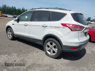 2014 Ford Escape SE z VIN 1FMCU9GX0EUC02583, wystawiony jako IAAI lot #42197013 z przebiegiem Nie podano mil oraz . Historia ofert i sprzedaży dostępna na DreamBid. Obrazek 3.