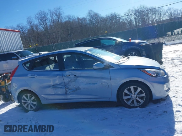 2012 Hyundai Accent SE with VIN KMHCU5AEXCU032097, listed as a IAAI auction lot 41143303 with 29,828 mi miles. Bid and sale history available at carsss.com. Image 13.