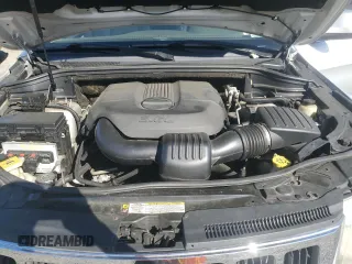 2011 Jeep Grand Cherokee Laredo with VIN 1J4RR4GG1BC714058, listed as a Copart auction lot 54974435 with 201,329 mi miles and Clean Title. Bid and sale history available at carsss.com. Image 12.