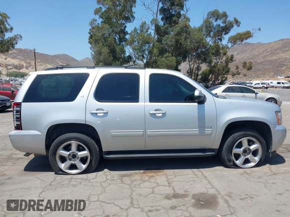 2012 Chevrolet Tahoe LT z VIN 1GNSCBE06CR255554, wystawiony jako IAAI lot #42544690 z przebiegiem 136 070 mil mil oraz . Historia ofert i sprzedaży dostępna na DreamBid. Obrazek 13.