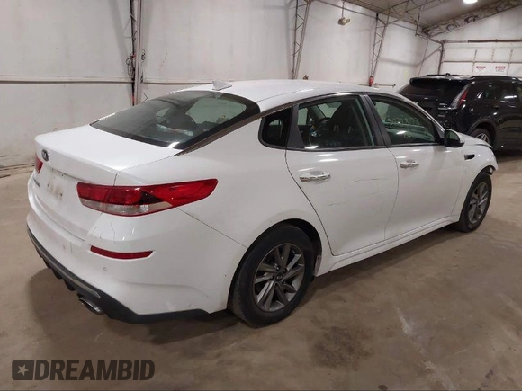 2020 Kia Optima LX with VIN 5XXGT4L33LG382675, listed as a IAAI auction lot 41574386 with 122,732 mi miles and . Bid and sale history available at DreamBid. Image 4.