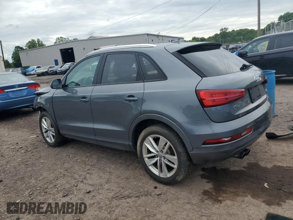 2017 Audi Q3 Premium z VIN WA1ECCFS5HR001606, wystawiony jako Copart lot #58276485 z przebiegiem 93 037 mil mil oraz Tytuł czysty. Historia ofert i sprzedaży dostępna na DreamBid. Obrazek 2.
