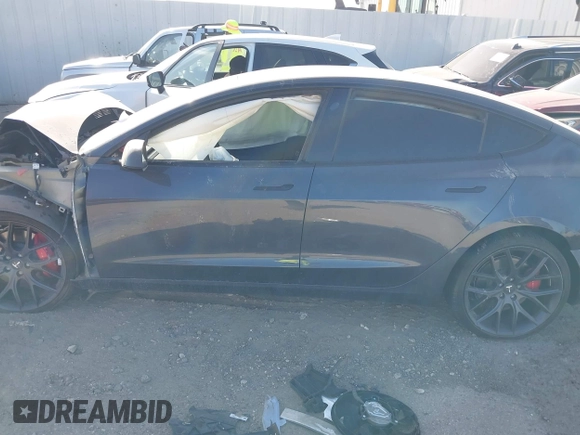 2022 Tesla Model 3 Performance with VIN 5YJ3E1EC3NF194197, listed as a IAAI auction lot 41825401 with Not Provided miles and . Bid and sale history available at DreamBid. Image 14.