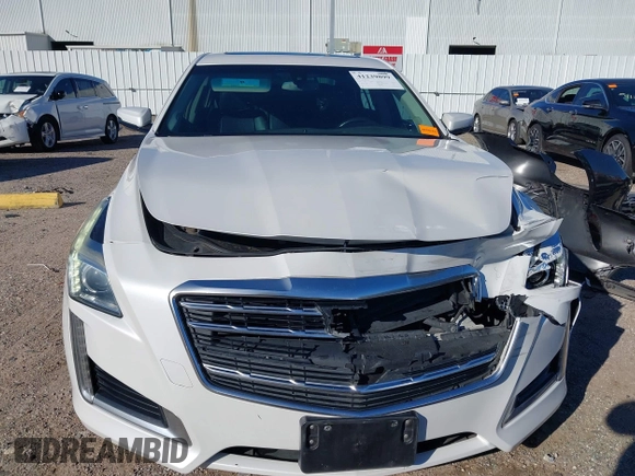 2019 Cadillac CTS RWD with VIN 1G6AP5SX0K0121219, listed as a IAAI auction lot 41239899 with 84,588 mi miles and . Bid and sale history available at DreamBid. Image 12.