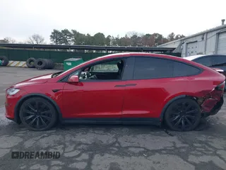 2022 Tesla Model X Plaid with VIN 7SAXCBE60NF330246, listed as a IAAI auction lot 41477394 with 51,612 mi miles and . Bid and sale history available at carsss.com. Image 14.