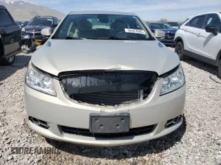 2012 Buick LaCrosse Leather z VIN 1G4GL5E35CF313502, wystawiony jako Copart lot #56487695 z przebiegiem 107 020 mil mil oraz Szkoda całkowita • Salvage title. Historia ofert i sprzedaży dostępna na DreamBid. Obrazek 5.