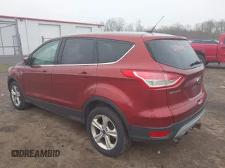 2014 Ford Escape SE with VIN 1FMCU9G97EUC50213, listed as a IAAI auction lot 42130075 with 235,406 mi miles. Bid and sale history available at carsss.com. Image 3.