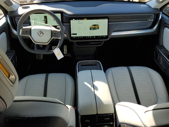 2023 Rivian R1S Adventure z VIN 7PDSGABA1PN009442, wystawiony jako Copart lot #45375605 z przebiegiem 28 047 mil mil oraz Szkody całkowita. Historia ofert i sprzedaży dostępna na DreamBid. Obrazek 8.