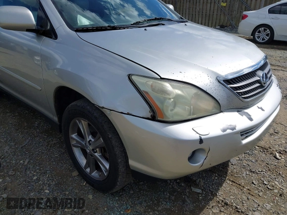 2007 Lexus RX 400h with VIN JTJGW31U672001021, listed as a IAAI auction lot 42209431 with 245,653 mi miles and . Bid and sale history available at DreamBid. Image 6.