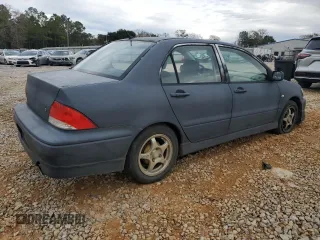2003 Mitsubishi Lancer OZ-Rally with VIN JA3AJ86E33U079131, listed as a Copart auction lot 88582825 with 213,593 mi miles and Salvage Title. Bid and sale history available at carsss.com. Image 3.