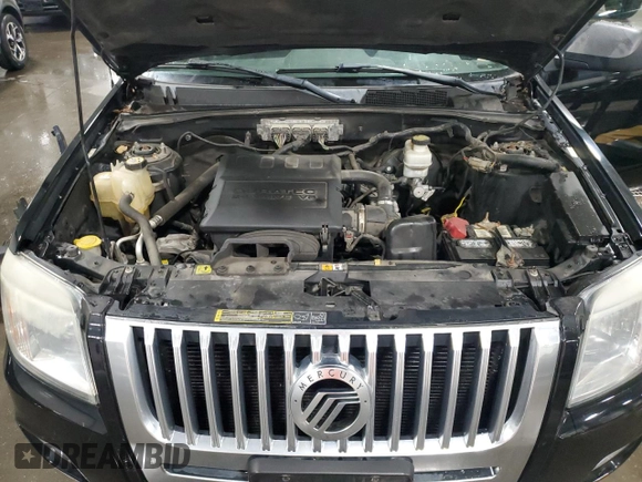 2009 Mercury Mariner z VIN 4M2CU91G09KJ05005, wystawiony jako Copart lot #53948974 z przebiegiem 183 351 mil mil oraz Szkoda całkowita • Salvage title. Historia ofert i sprzedaży dostępna na DreamBid. Obrazek 11.