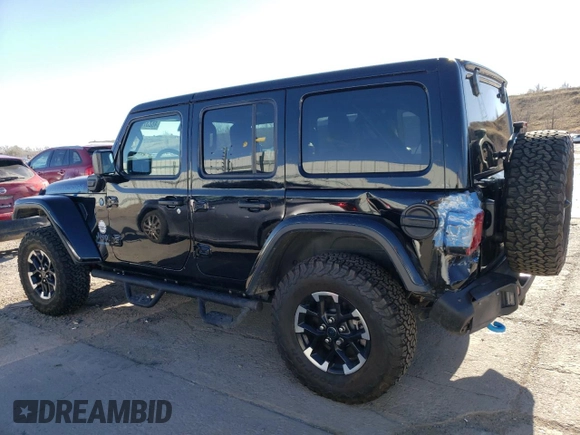 2024 Jeep Wrangler Rubicon with VIN 1C4RJXR69RW132849, listed as a Copart auction lot 48237325 with 18,725 mi miles and Salvage Title. Bid and sale history available at DreamBid. Image 2.