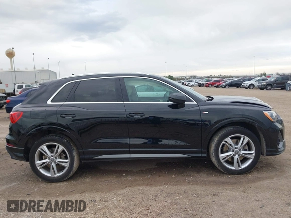2020 Audi Q3 S line Premium z VIN WA1DECF34L1088002, wystawiony jako IAAI lot #41332352 z przebiegiem 41 196 mil mil oraz . Historia ofert i sprzedaży dostępna na DreamBid. Obrazek 13.