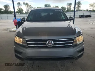 2021 Volkswagen Tiguan SE z VIN 3VV3B7AX1MM126044, wystawiony jako Copart lot #61306415 z przebiegiem 73 159 mil mil oraz Szkoda całkowita • Salvage title. Historia ofert i sprzedaży dostępna na DreamBid. Obrazek 5.