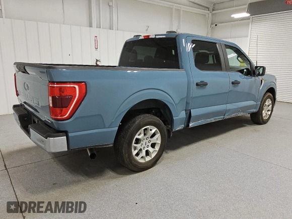 2023 Ford F-150 XL with VIN 1FTEW1C89PKE14033, listed as a Copart auction lot 58328605 with 53,902 mi miles and Clean title. Bid and sale history available at DreamBid. Image 3.