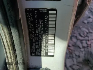 2000 BMW 5 Series 528iA with VIN WBADM6344YGU10582, listed as a Copart auction lot 77468634 with 0 mi miles and Salvage Title. Bid and sale history available at carsss.com. Image 12.
