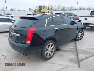 2015 Cadillac SRX Premium Collection z VIN 3GYFNDE3XFS576695, wystawiony jako IAAI lot #41612836 z przebiegiem Nie podano mil oraz . Historia ofert i sprzedaży dostępna na DreamBid. Obrazek 4.