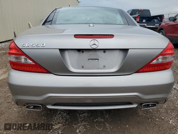 2009 Mercedes-Benz SL 550 with VIN WDBSK71F49F143492, listed as a Copart auction lot 88757425 with 89,117 mi miles and Salvage title. Bid and sale history available at DreamBid. Image 6.