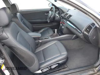 2009 BMW 1 Series 128i with VIN WBAUP73559VF07103, listed as a IAAI auction lot 41777559 with 125,316 mi miles and . Bid and sale history available at carsss.com. Image 5.