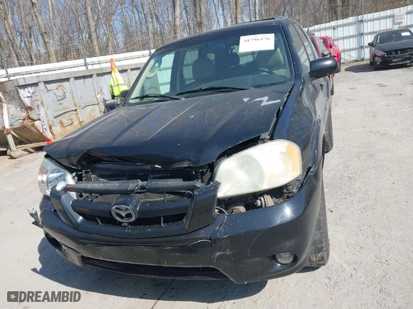 2005 Mazda Tribute s with VIN 4F2YZ06165KM39949, listed as a IAAI auction lot 41796476 with 270,492 mi miles. Bid and sale history available at carsss.com. Image 12.