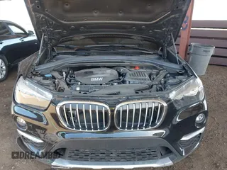2018 BMW X1 sDrive28i z VIN WBXHU7C35J5L06673, wystawiony jako IAAI lot #42275787 z przebiegiem 61 204 mil mil oraz . Historia ofert i sprzedaży dostępna na DreamBid. Obrazek 10.